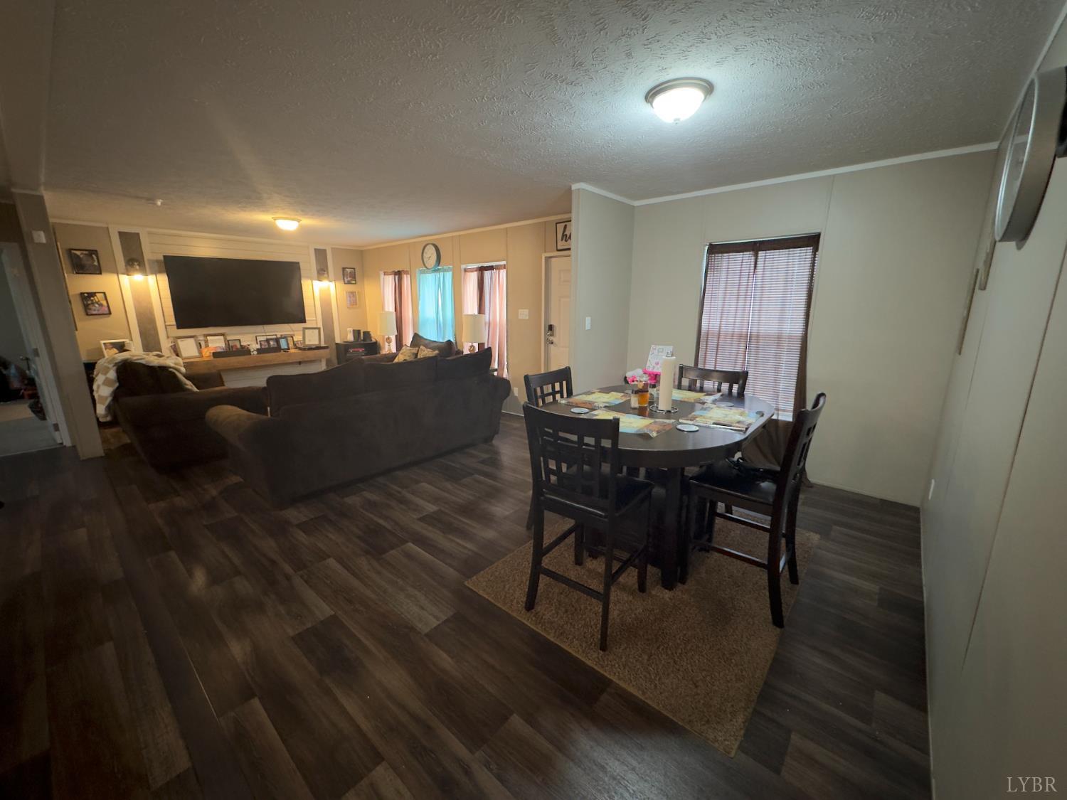 3772 Promise Land Road Appomattox, VA 24522 - Photo 23 of 28 a living room with furniture and a wooden floor