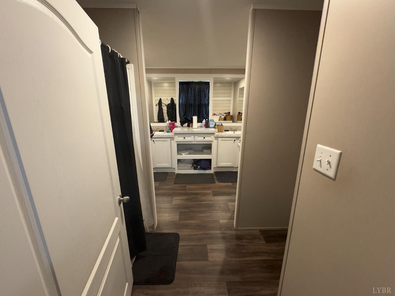3772 Promise Land Road Appomattox, VA 24522 - Photo 25 of 28 a view of a hallway and a livingroom with furniture