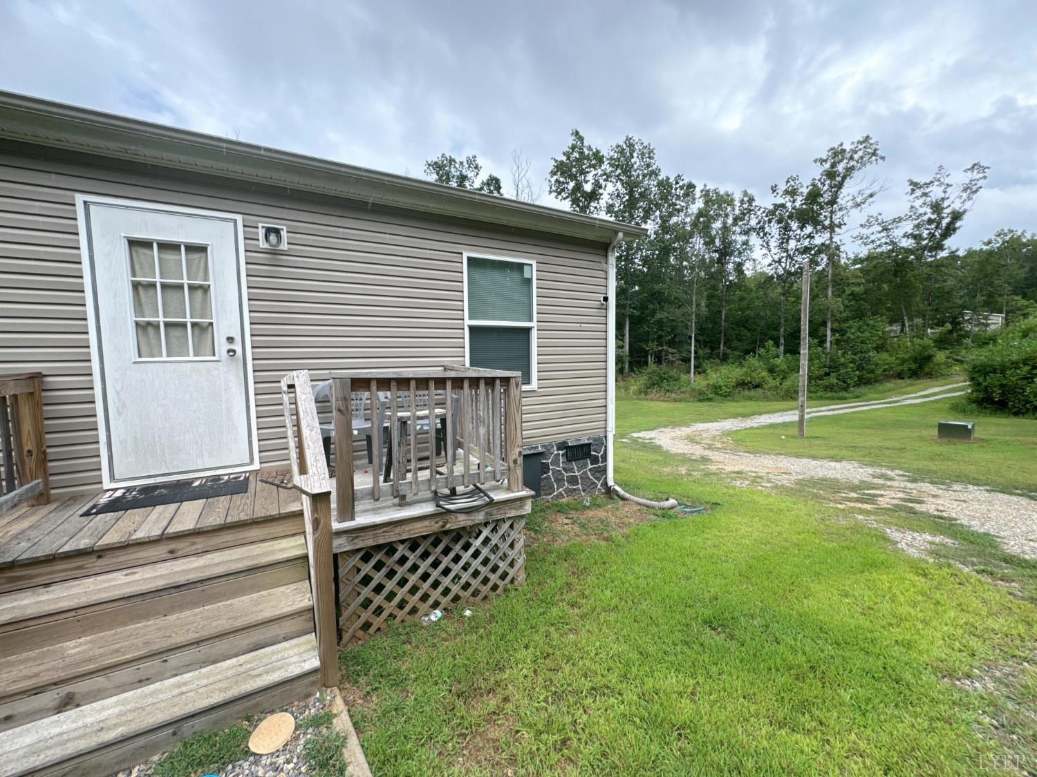 3772 Promise Land Road Appomattox, VA 24522 - Photo 5 of 28 a view of house with backyard and deck