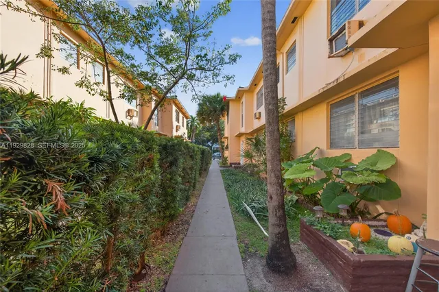 a bathroom with a sink and shower