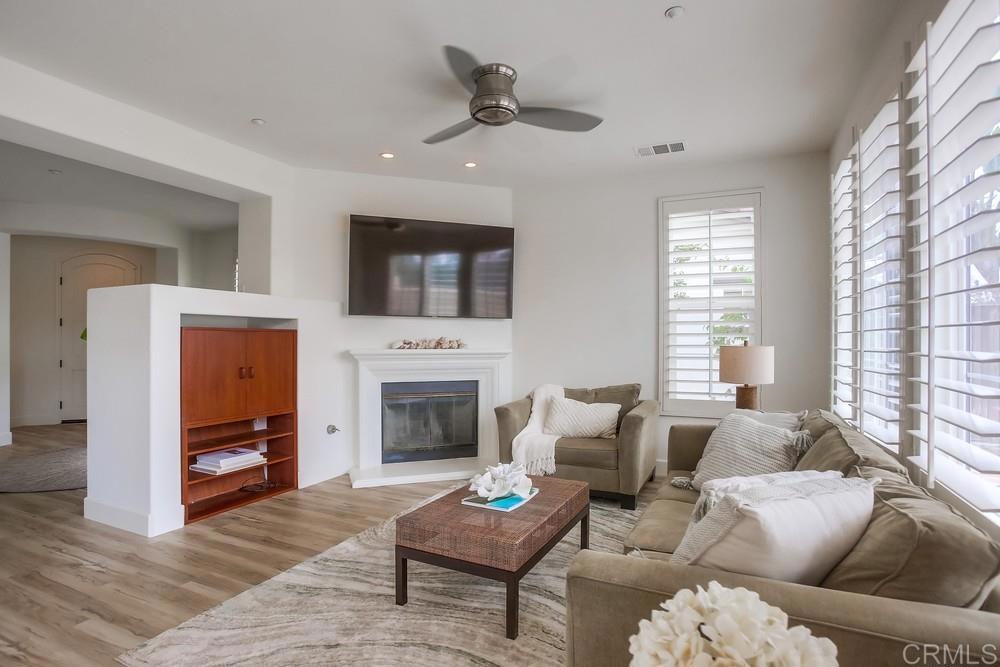 518 Beach Street Encinitas, CA 92024 - Photo 10 of 43 a living room with furniture a window and a fireplace