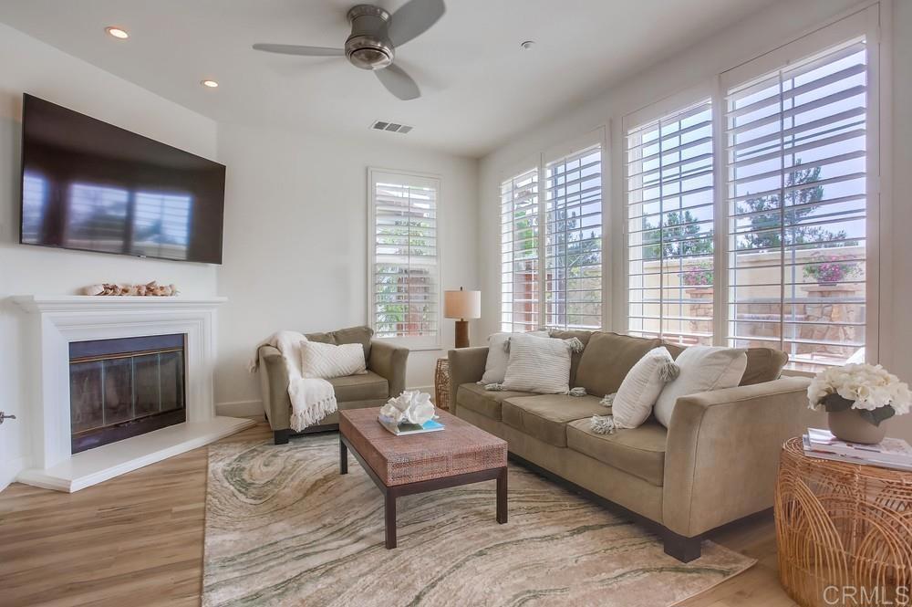 518 Beach Street Encinitas, CA 92024 - Photo 2 of 43 a living room with furniture fireplace and flat screen tv