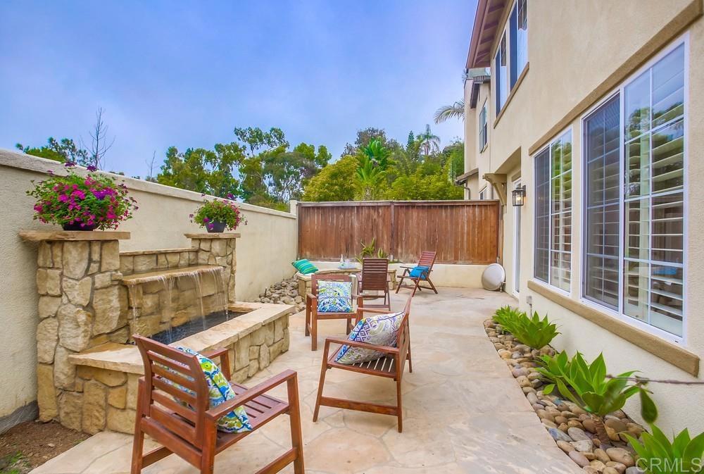 518 Beach Street Encinitas, CA 92024 - Photo 20 of 43 a view of a chairs and table in the patio