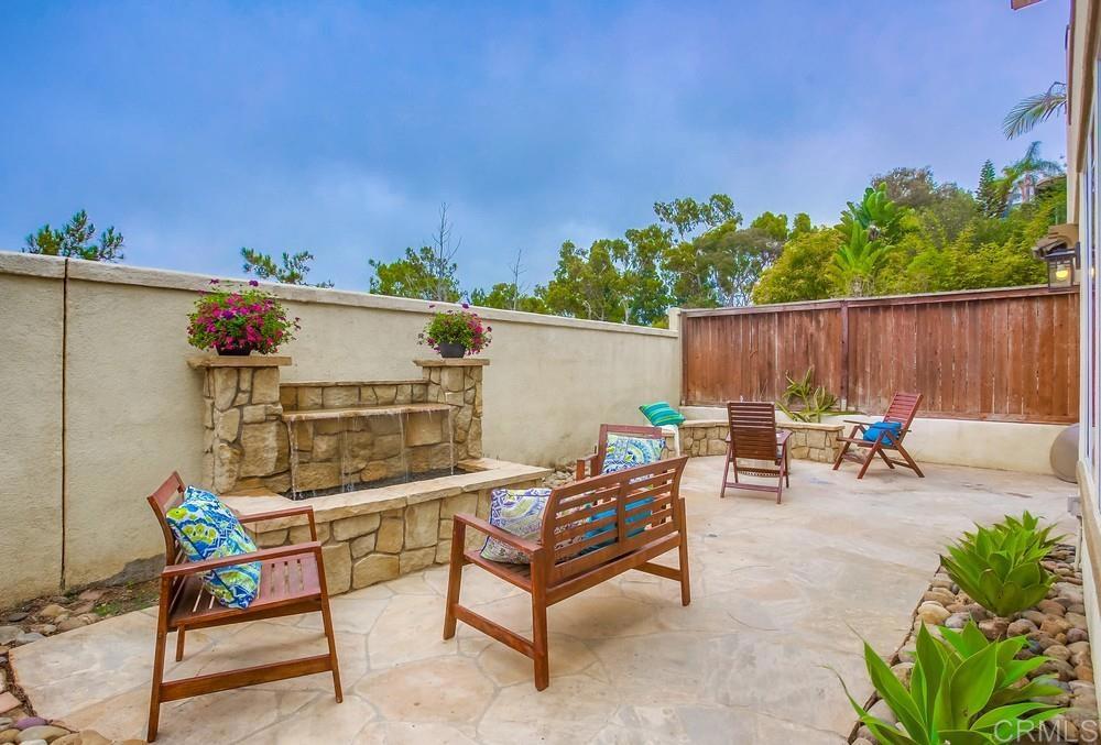 518 Beach Street Encinitas, CA 92024 - Photo 21 of 43 a view of a backyard with a patio and a fire pit
