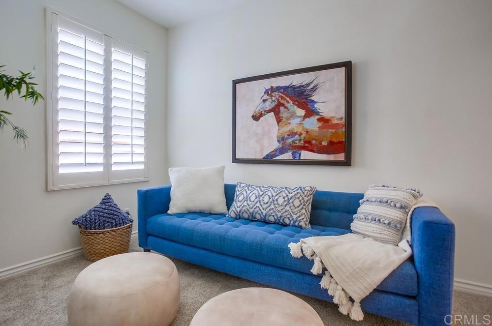 518 Beach Street Encinitas, CA 92024 - Photo 28 of 43 a living room with furniture and a large window