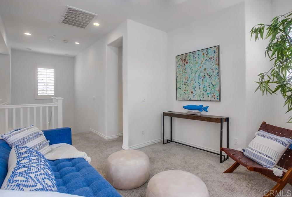 518 Beach Street Encinitas, CA 92024 - Photo 29 of 43 a living room with furniture and a potted plant