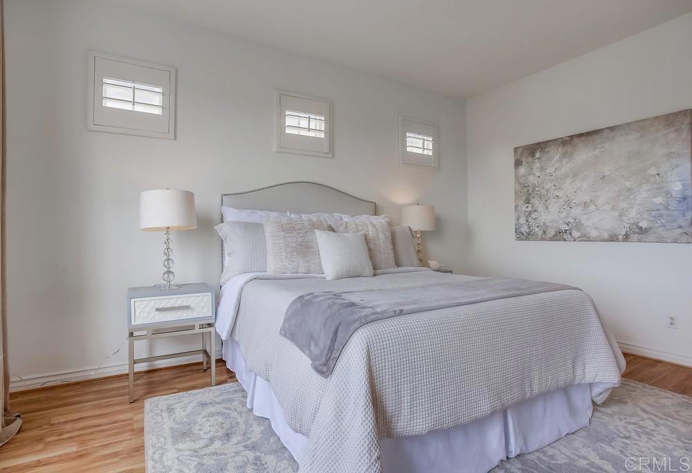 518 Beach Street Encinitas, CA 92024 - Photo 32 of 43 a bedroom with a bed and a night stand