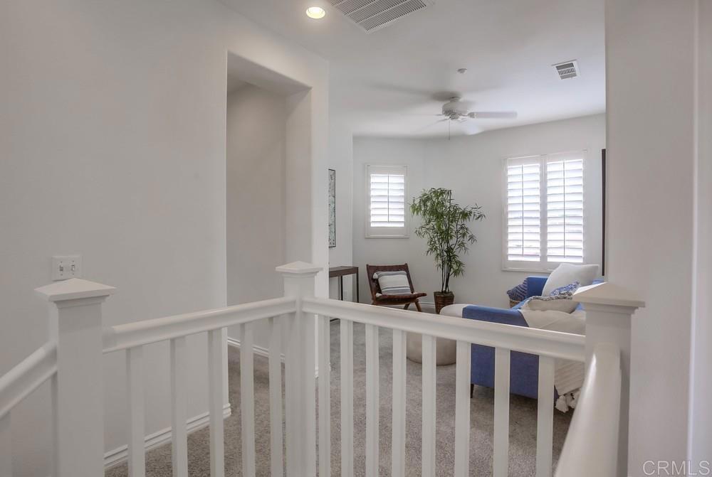 518 Beach Street Encinitas, CA 92024 - Photo 40 of 43 a bedroom with furniture and a potted plant