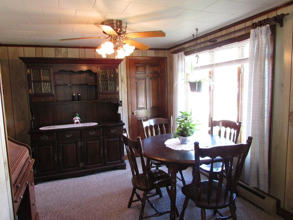377 County Road Rochester, MA 02576 - Photo 15 of 28 a dining room with furniture and window