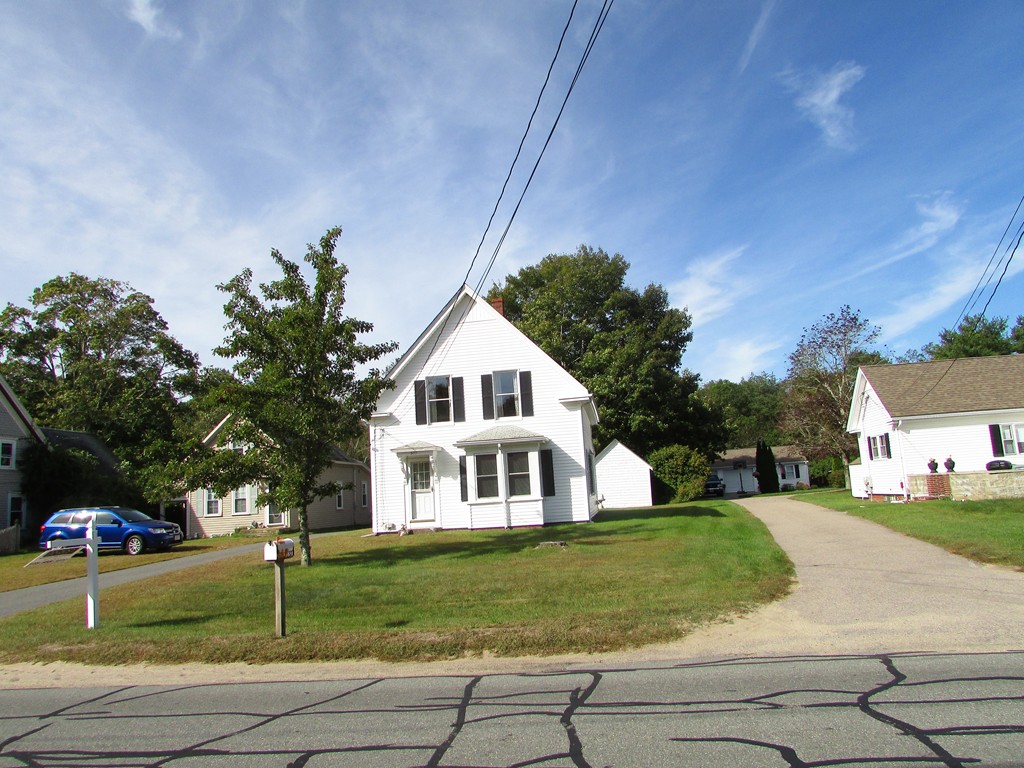 377 County Road Rochester, MA 02576 - Photo 2 of 28 a front view of a house with a yard