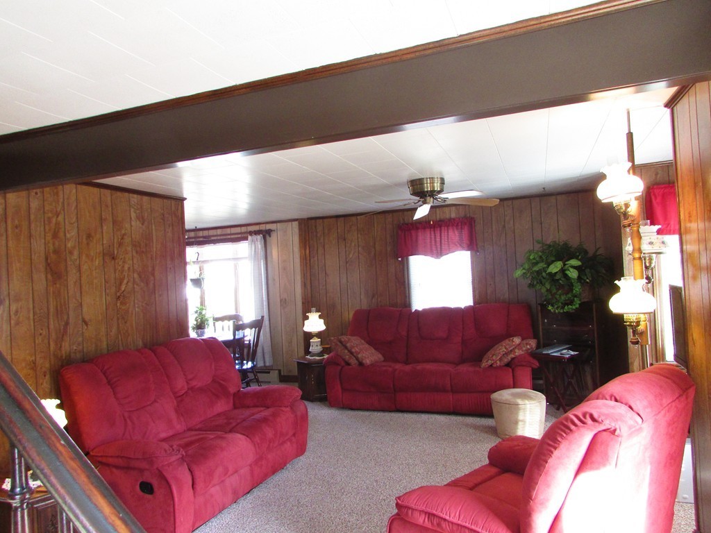 377 County Road Rochester, MA 02576 - Photo 10 of 28 a living room with furniture flowerpot and window