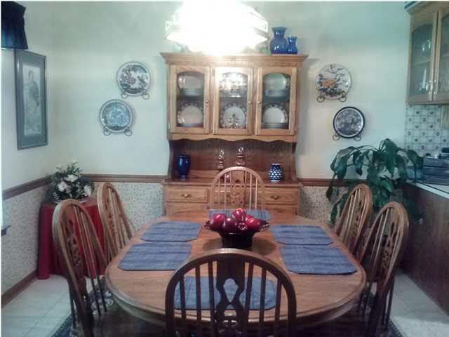 1494 Chemstrand Road Cantonment, FL 32533 - Photo 2 of 25 FORMAL DINING ROOM COMES OFF KITCHEN