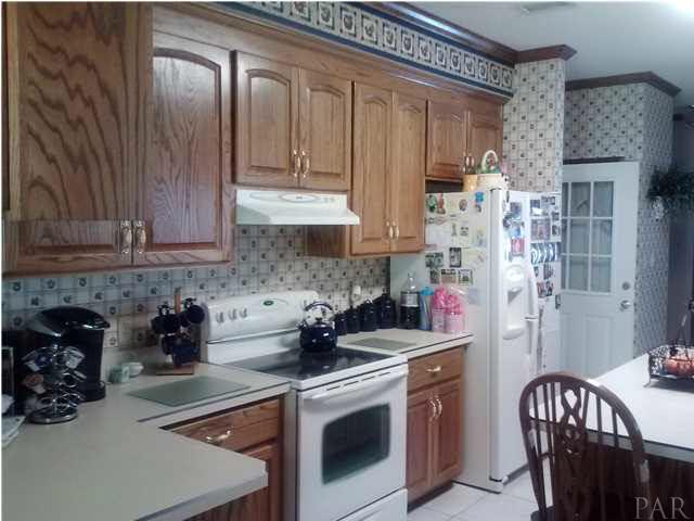 1494 Chemstrand Road Cantonment, FL 32533 - Photo 10 of 25 PLENTY OF CABINET SPACE IN THESE CUSTOM BUILT CABINETS