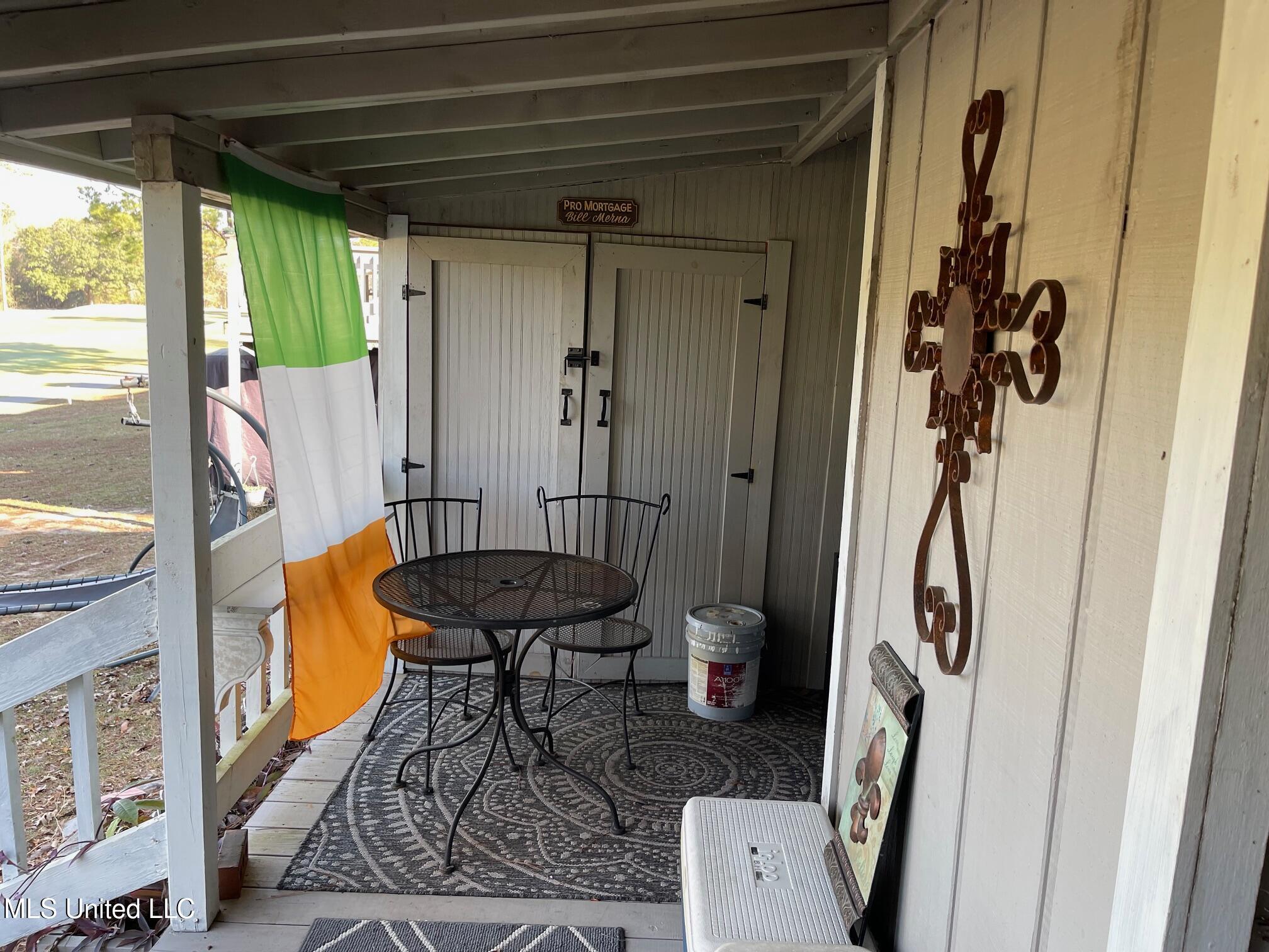 212 Highpoint Drive Diamondhead, MS 39525 - Photo 23 of 31 Back Porch