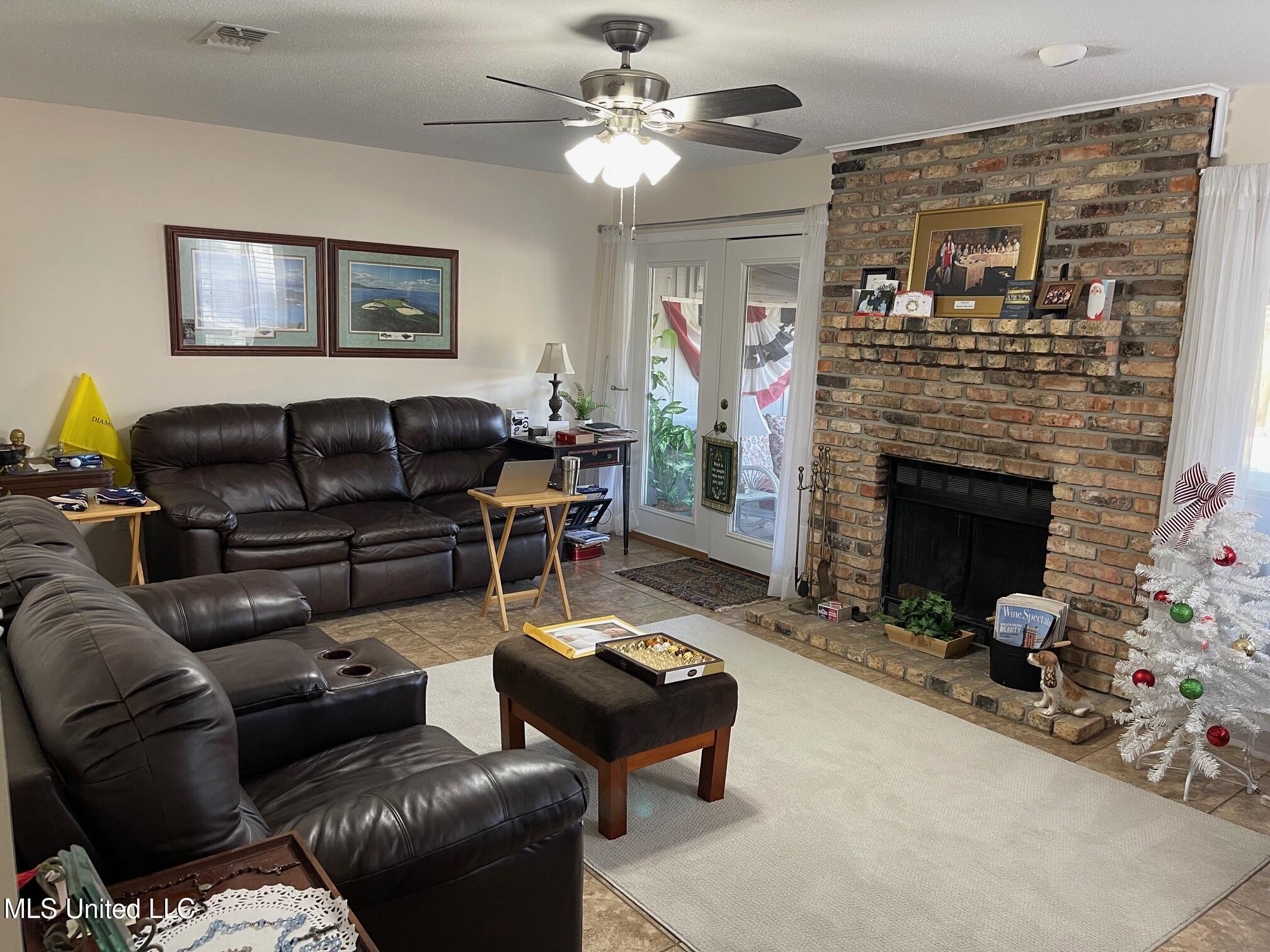 212 Highpoint Drive Diamondhead, MS 39525 - Photo 7 of 31 View of Den from Front Door
