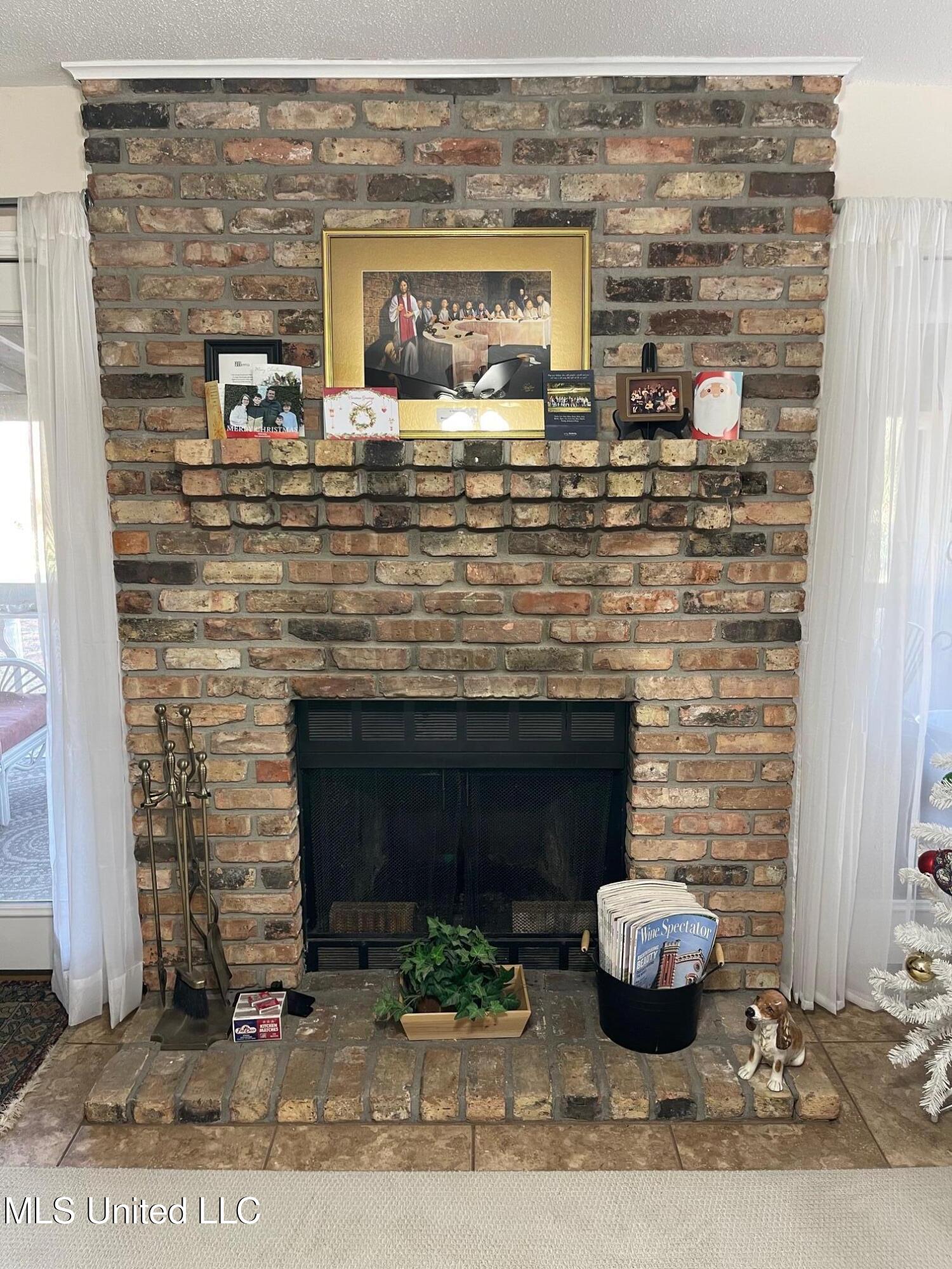 212 Highpoint Drive Diamondhead, MS 39525 - Photo 8 of 31 Fireplace