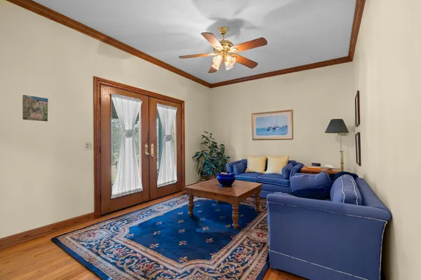 a living room with furniture and a rug