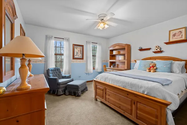 a bed room with a bed and a couch