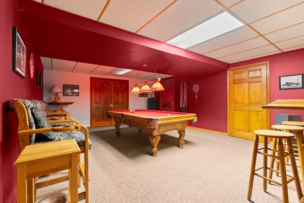 a room with furniture and a flat screen tv