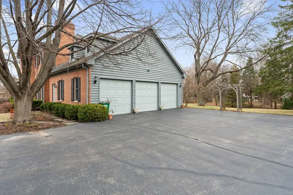 a aerial view of a house with a yard
