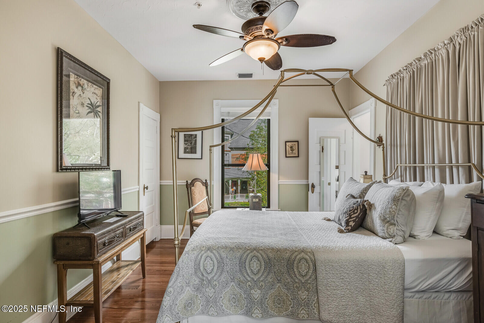 102 South 7th Street Fernandina Beach, FL 32034 - Photo 33 of 65 a bedroom with a bed dresser and a window