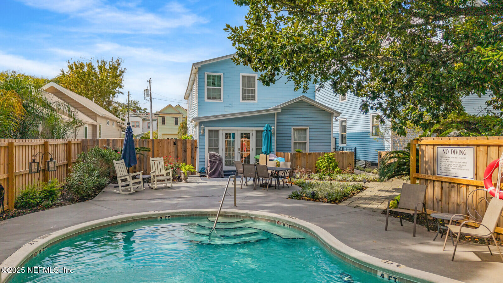 102 South 7th Street Fernandina Beach, FL 32034 - Photo 61 of 65 a front view of house with yard outdoor seating and green space