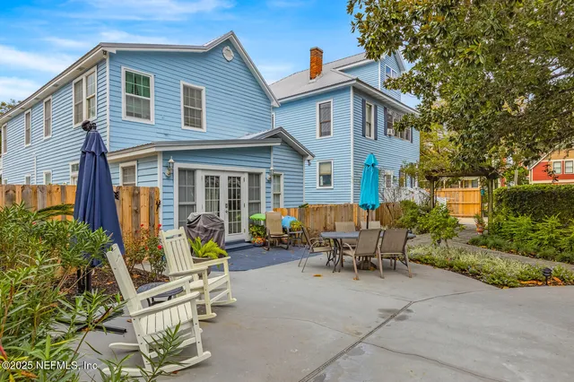 a kitchen with stainless steel appliances kitchen island granite countertop a stove a sink and a microwave