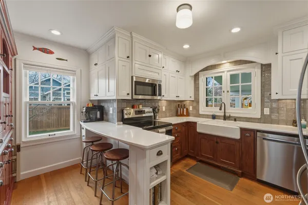 a bathroom with a sink a vanity and mirror