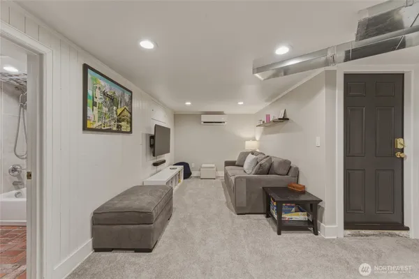 a en suite bathroom with a sink a toilet and bathtub