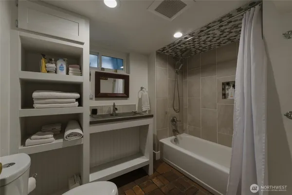 a bathroom with a bathtub