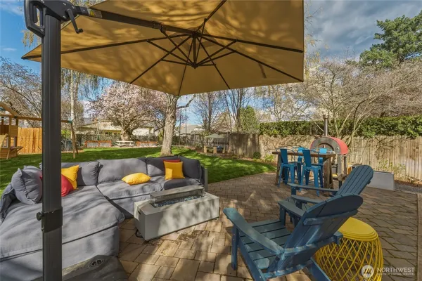 a front view of a house with a yard porch and sitting area