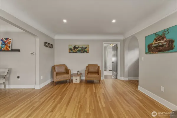 a view of a livingroom with furniture and wooden floor