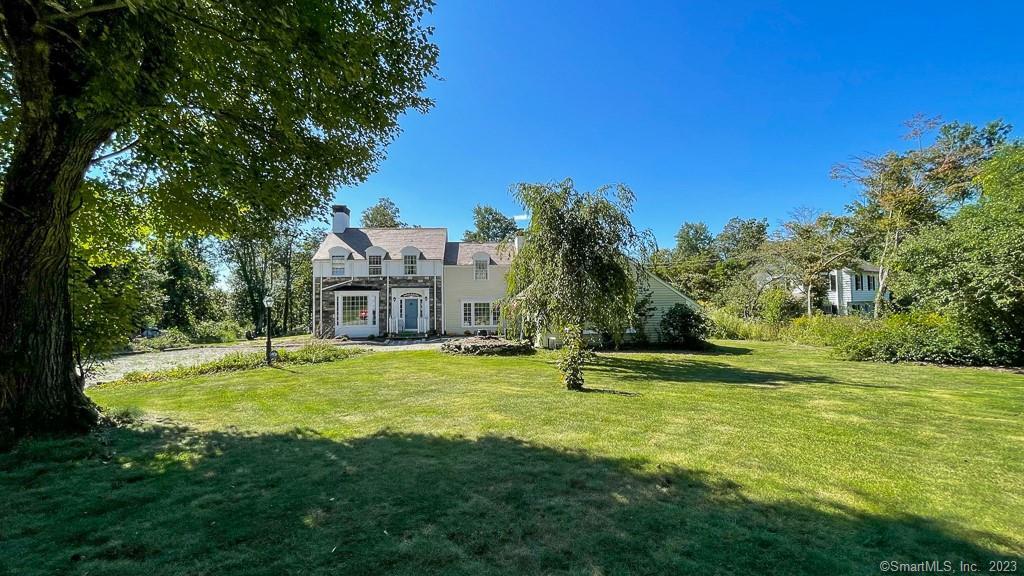 100 Whisconier Road Brookfield, CT 06804 - Photo 1 of 1 a swimming pool with trees in the background