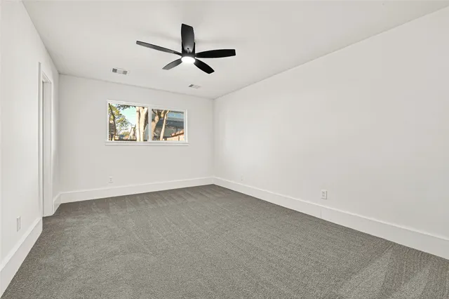 a bathroom with a double vanity sink toilet and shower