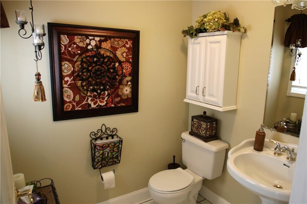338 Wilson Road Clinton, PA 15026 - Photo 14 of 23 Powder Room right off the Family Room
