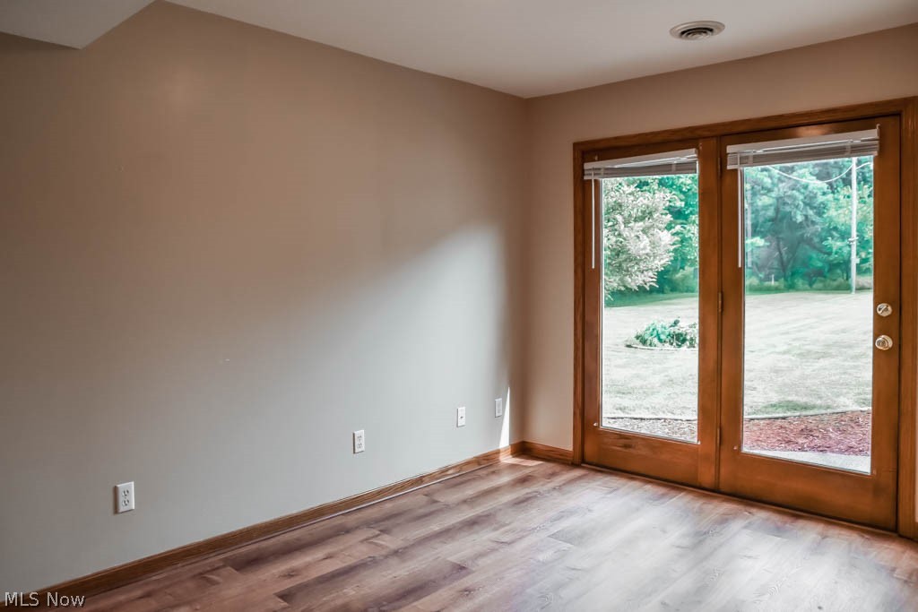 306 Everhard Road Southwest North Canton, OH 44709 - Photo 26 of 35 Bedroom in the in-law suite with backyard access.