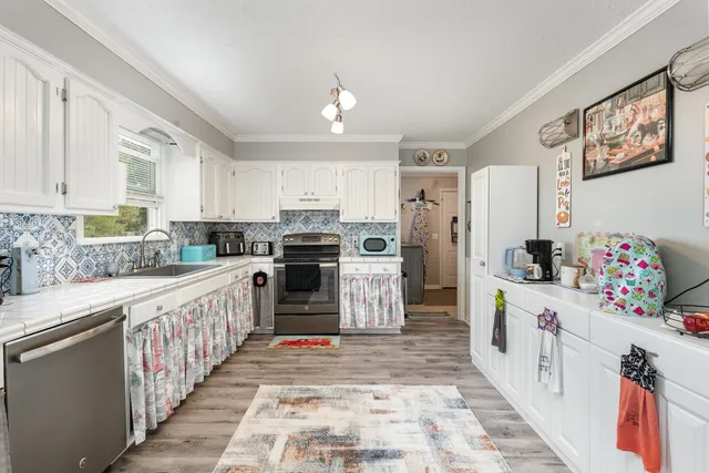 a view of storage and utility room with washer and dryer
