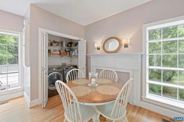 a bathroom with a sink a mirror and a toilet