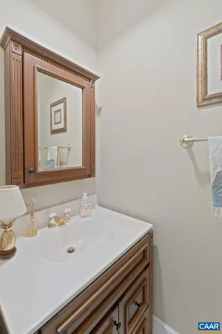 a bedroom with a bed and a television