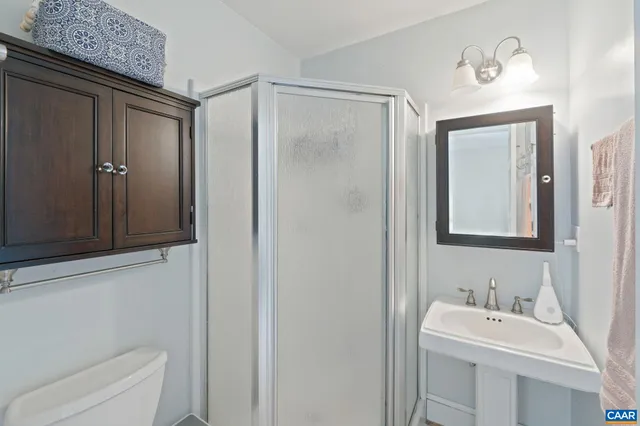 a view of a chairs and table on the wooden floor