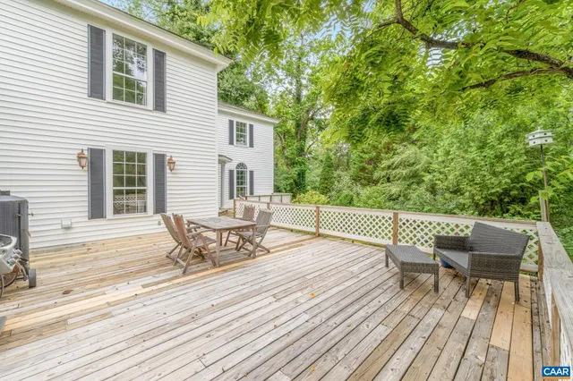 a backyard of a house with seating space