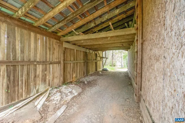 a view of a field with an ocean view