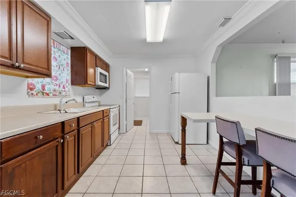 $2,000 | 312 Grovewood Avenue South, Lehigh Acres, FL 33936