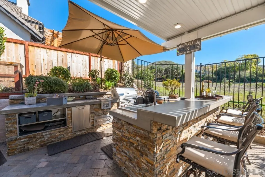 a view of an outdoor dining space with furniture