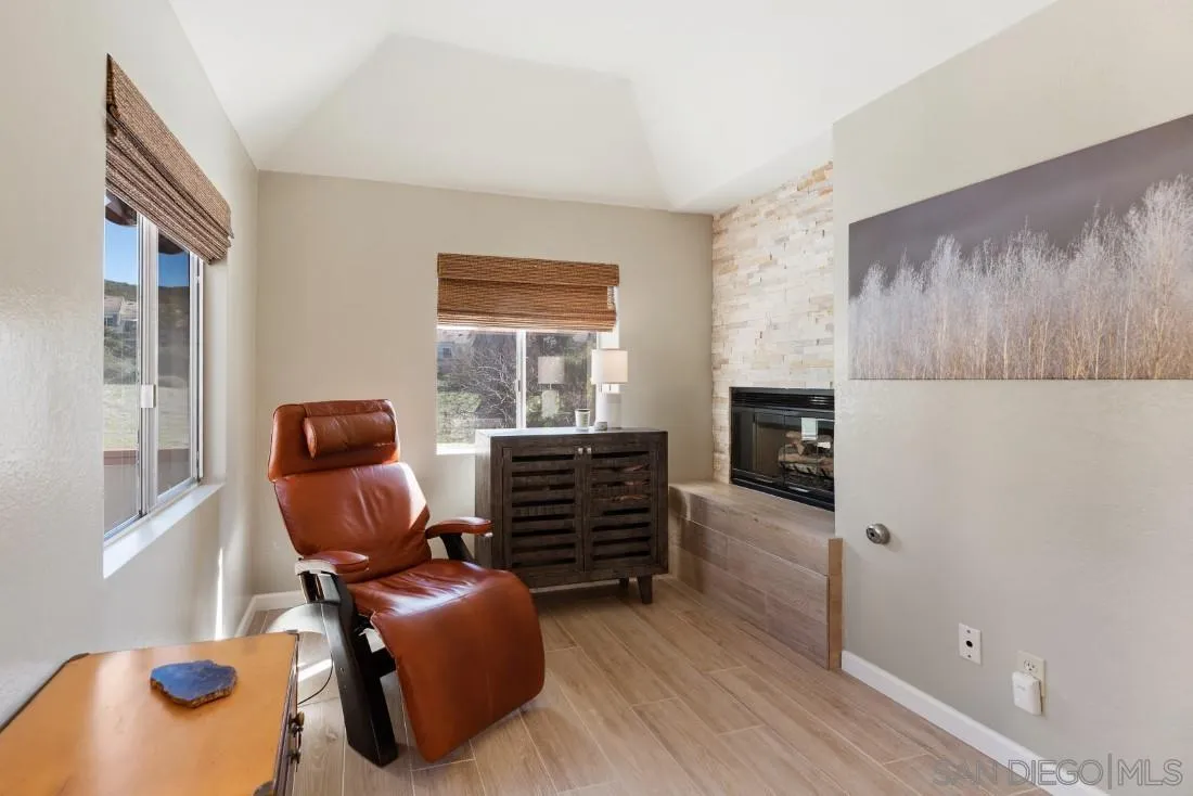 13755 Royal Melbourne Square San Diego, CA 92128 - Photo 59 of 75 a living room with furniture and a window