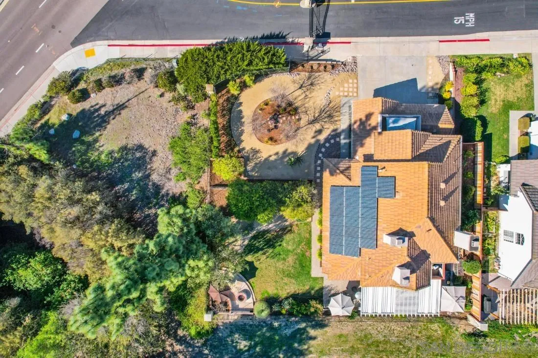 13755 Royal Melbourne Square San Diego, CA 92128 - Photo 64 of 75 an aerial view of a house with a yard and garden