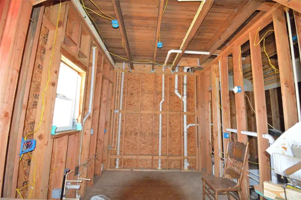 a view of a door with wooden floor and door