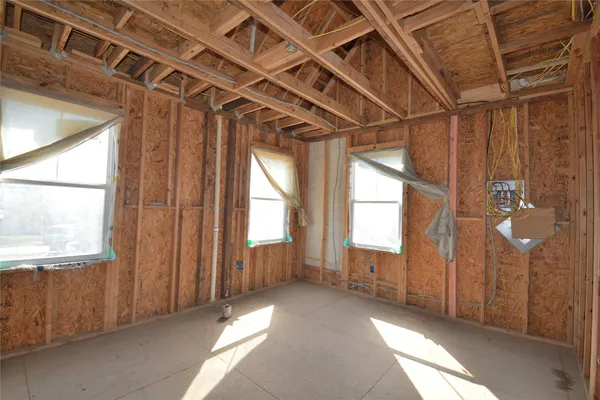 a view of a room with windows