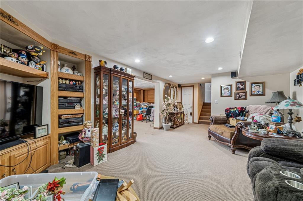 228 Ridgeview Drive Venetia, PA 15367 - Photo 24 of 37 a living room with lots of furniture and white walls