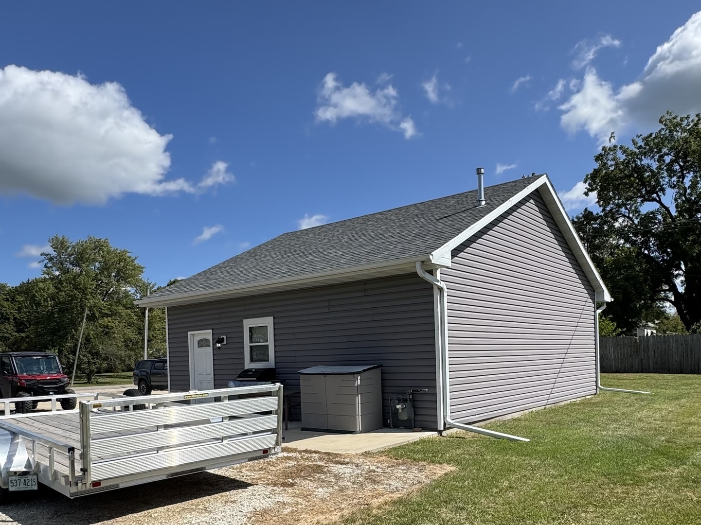 302 East Harrison Street Ransom, IL 60470 - Photo 13 of 19 a view of backyard of a house